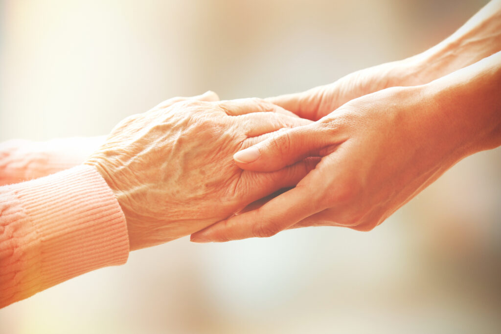 Image of Helping hands, care for the elderly concept.